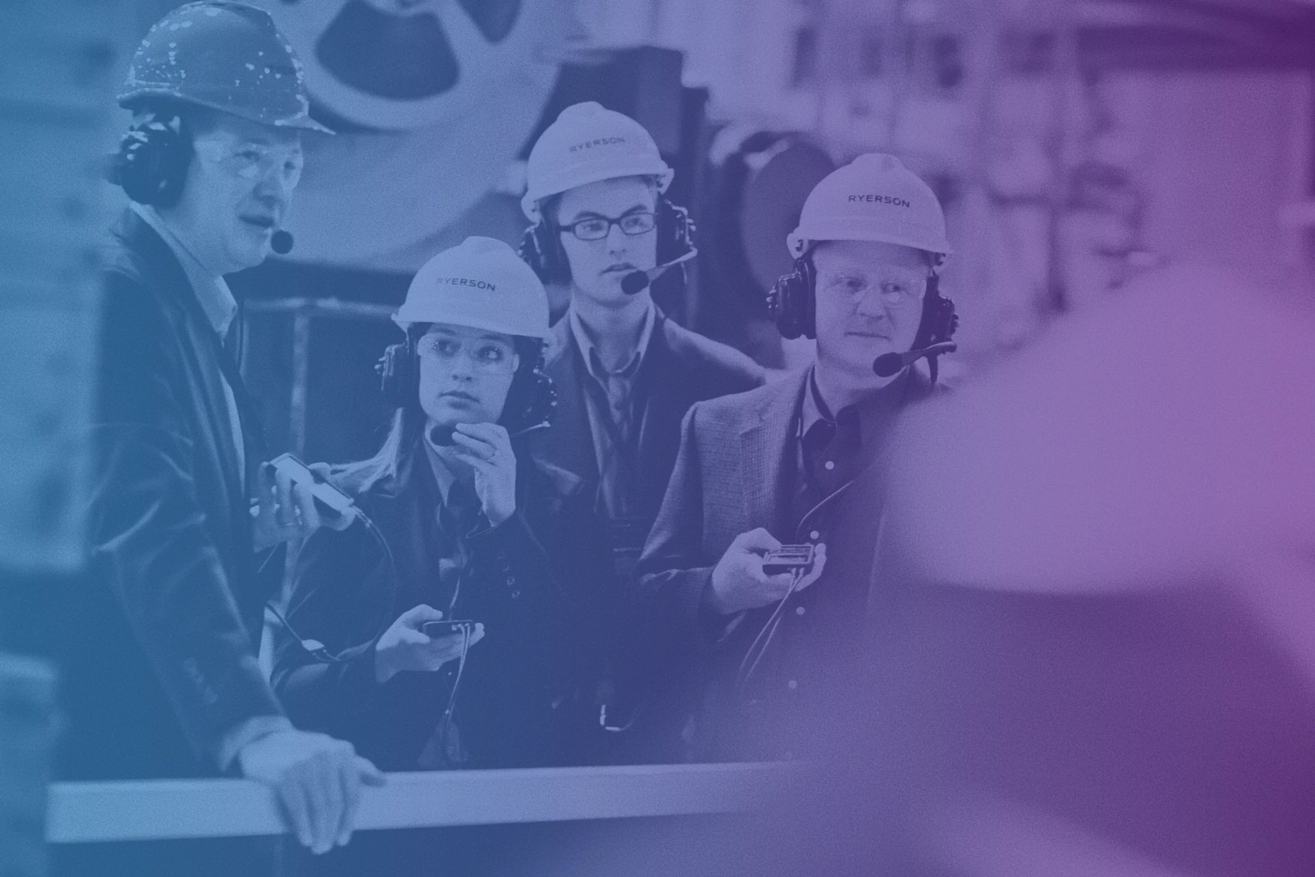 People on a factory tour wearing hard hats and headsets